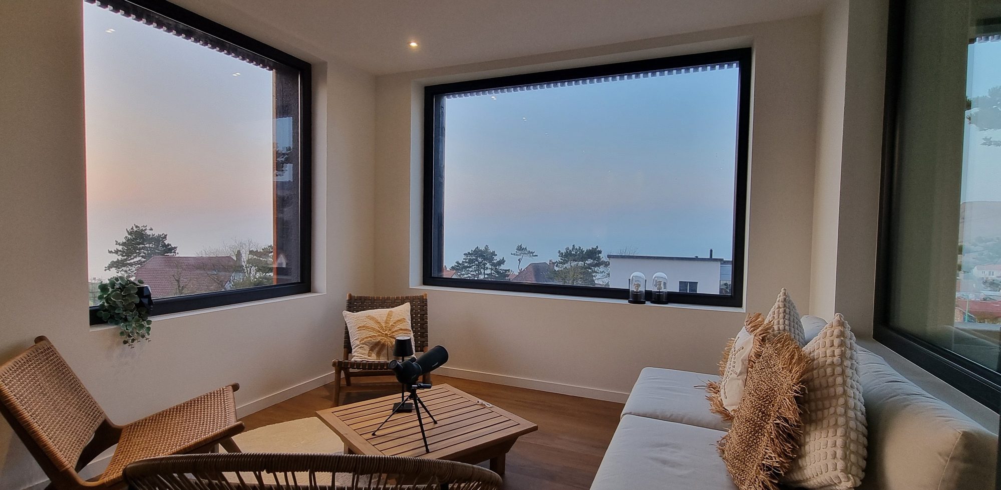 Salon cocon avec vue sur la mer